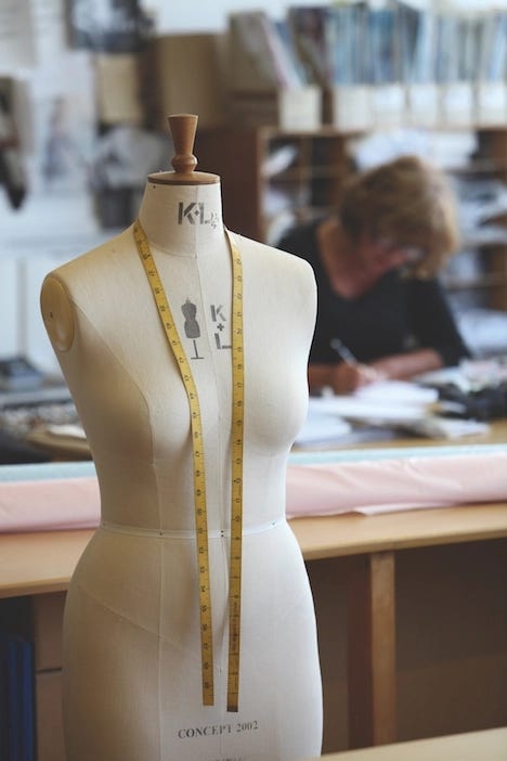 A David Nieper dress being fitted on a model