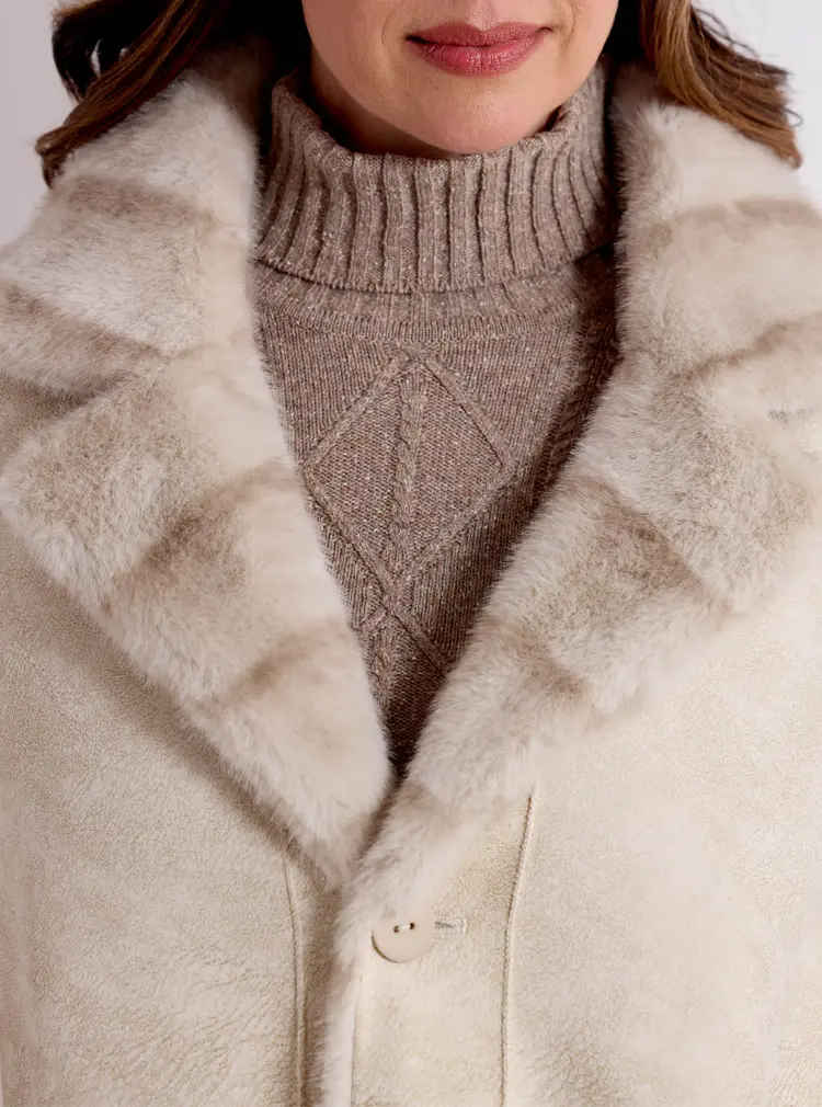 Manteau réversible en fausse fourrure